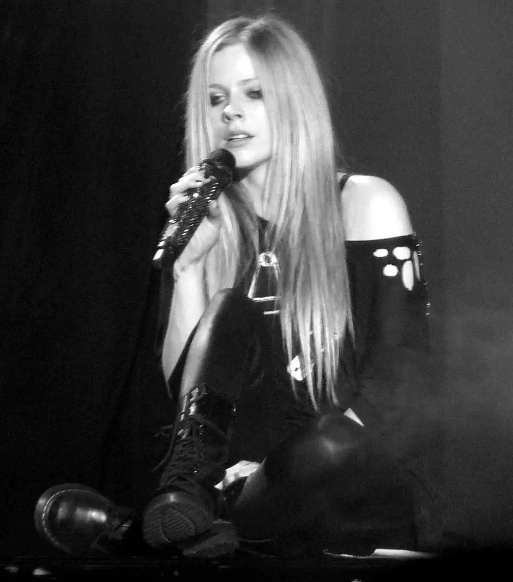 Avril Lavigne performing in 2011. She is alive and has dismissed the replacement theory.