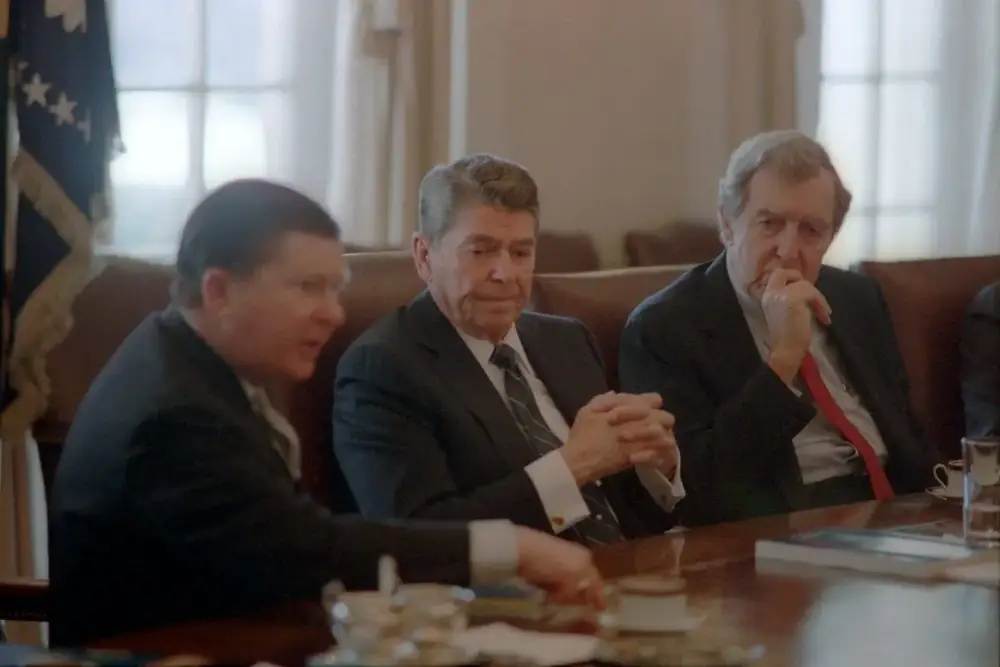 President Reagan receives the Tower Commission report, Feb. 26, 1987.