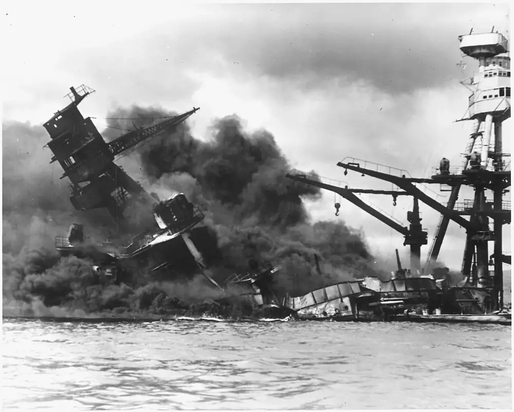 USS Arizona burning after the Japanese attack on Pearl Harbor, December 7, 1941.